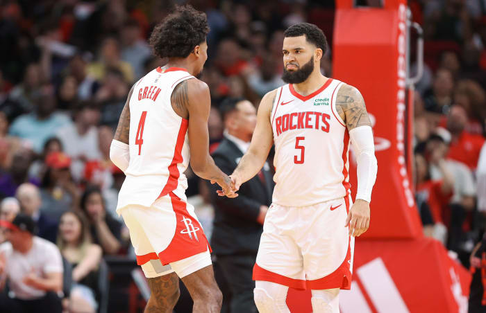 Rockets guard Jalen Green (4) celebrates with guard Fred VanVleet (5) after a play during the second half against the San Antonio Spurs at Toyota Center.